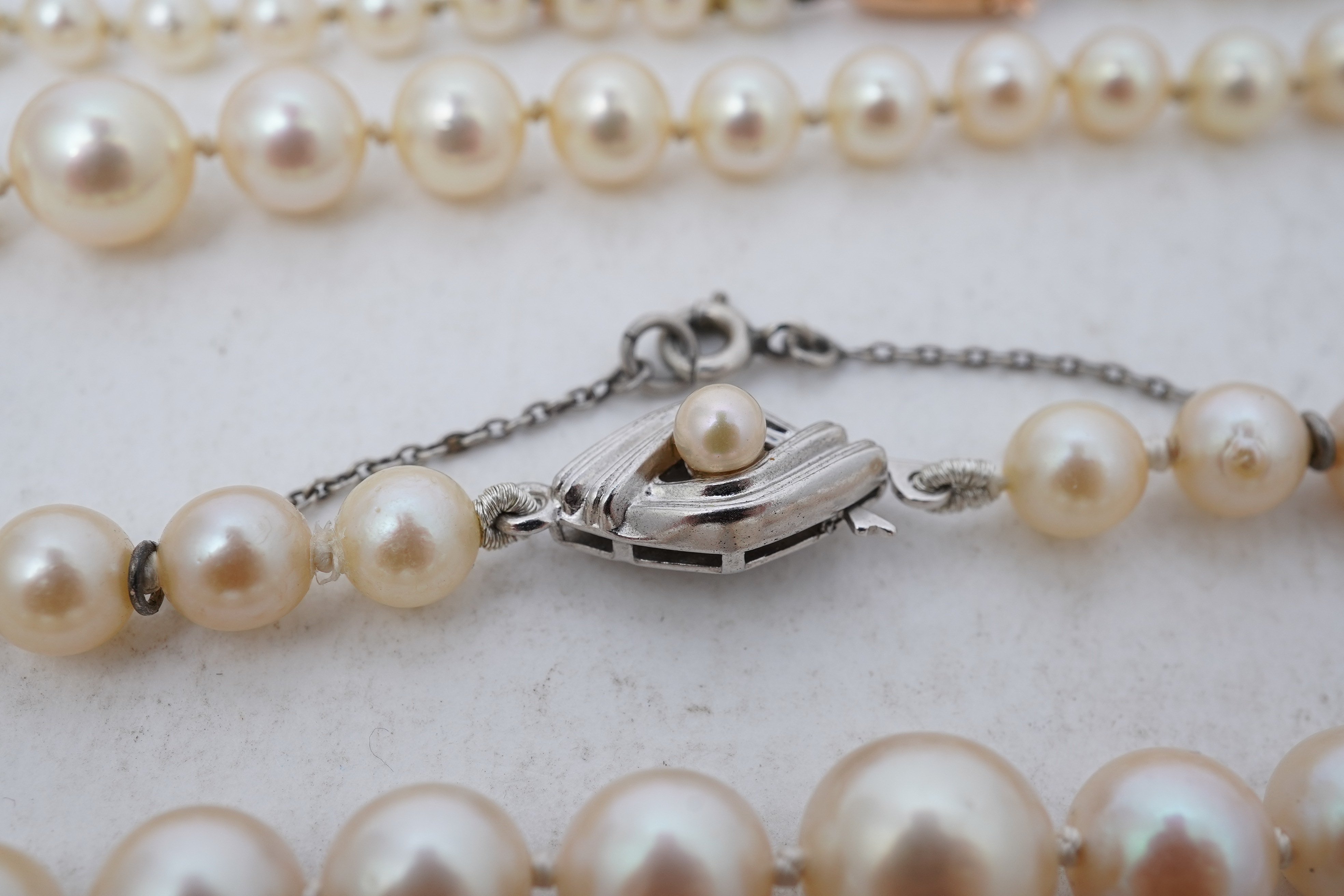 Five cultured pearl necklaces